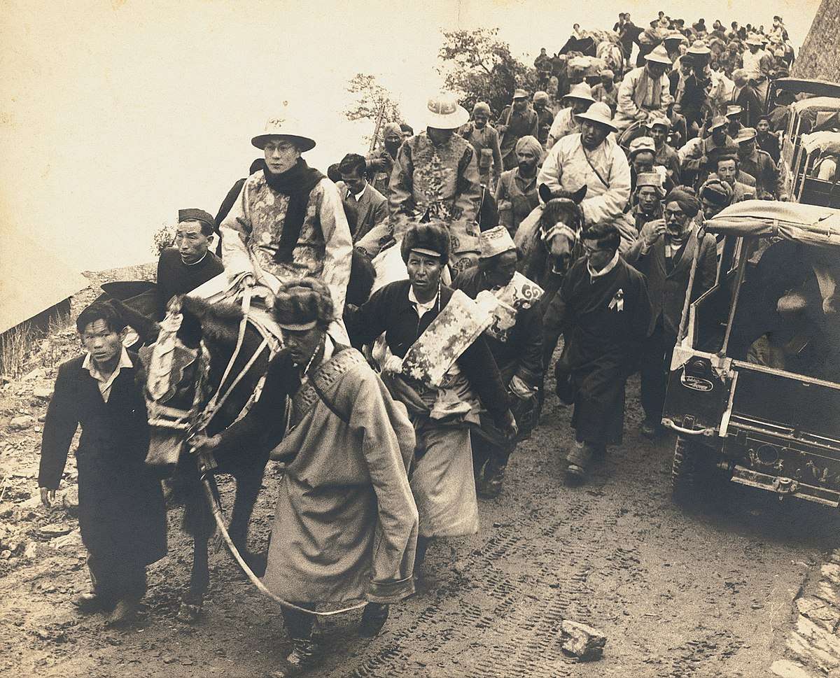 File:The Dalai Lama in ceremonial dress enters India through a high  mountain pass, Sikkim, 1956.jpg - Wikimedia Commons