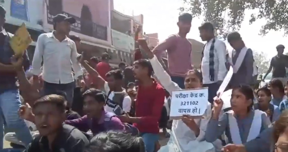 Angry students blocked the road due to change of examination center