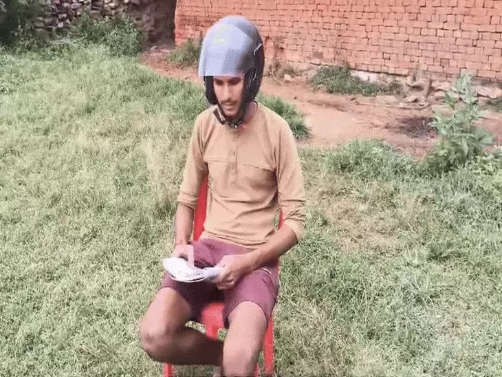 Villagers in Rewa are living wearing helmets