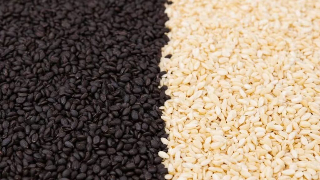 Two bowls of black and white sesame seeds, which are said to have different health benefits during winter.