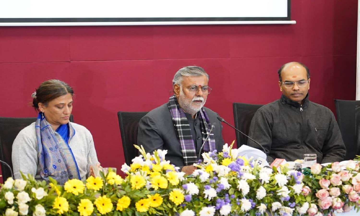 Officials of the Madhya Pradesh Labour Department discussing new welfare targets for workers.