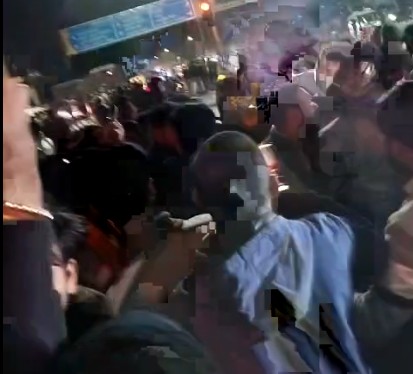 Police inspecting a truck loaded with meat packets near Bhopal Police Headquarters