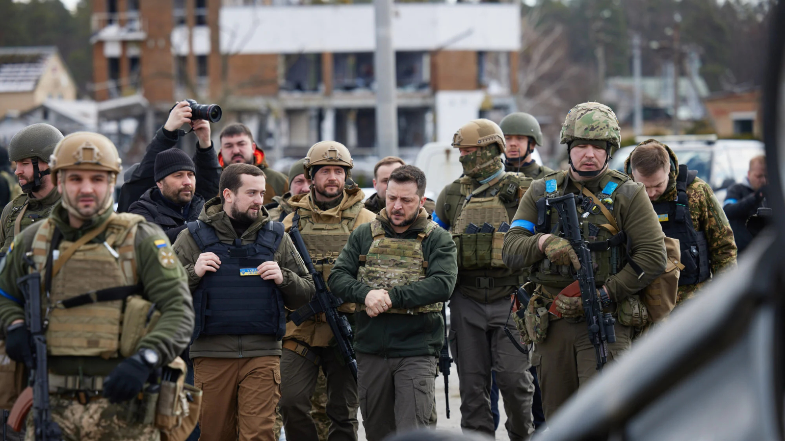 Ukrainian security personnel amid ongoing Russia-Ukraine war, following reported drone and guided bomb attacks.