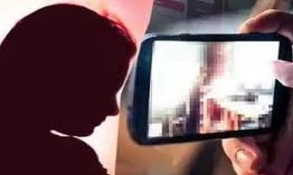 Representative image showing a mobile phone misuse case related to privacy violation at a public place