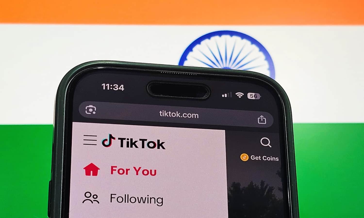 The TikTok app logo displayed on a smartphone screen as discussions continue over a possible return in India.