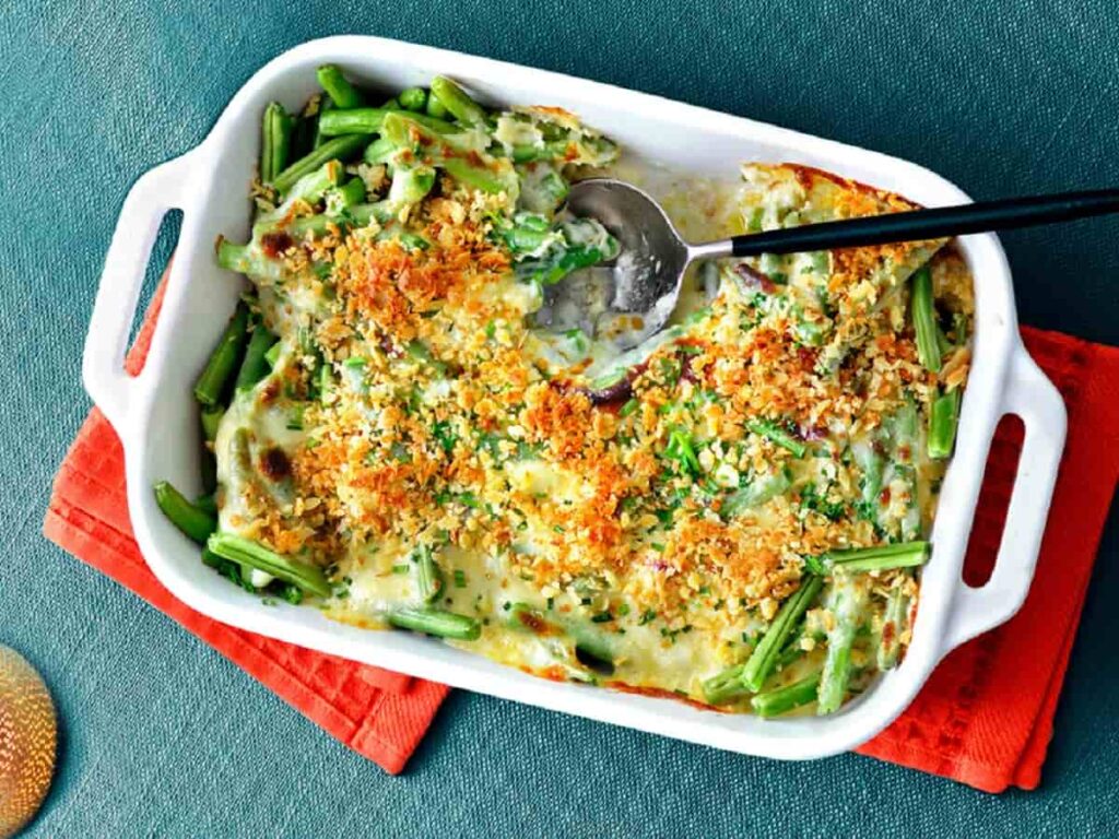 Creamy green bean casserole baked and served as a Christmas side dish