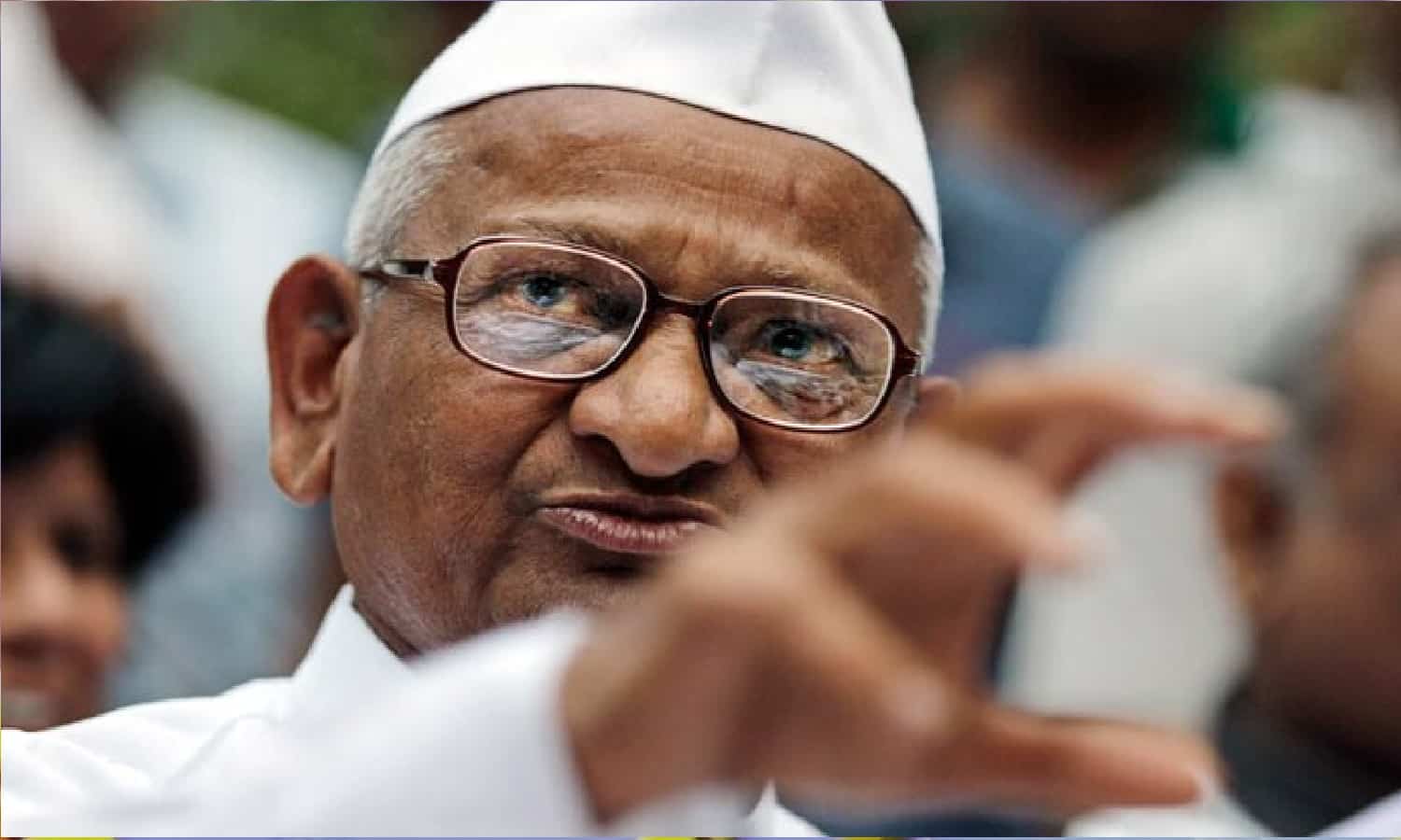 Anna Hazare speaking at a press conference, where he mentioned preparations for a fast unto death against the BJP