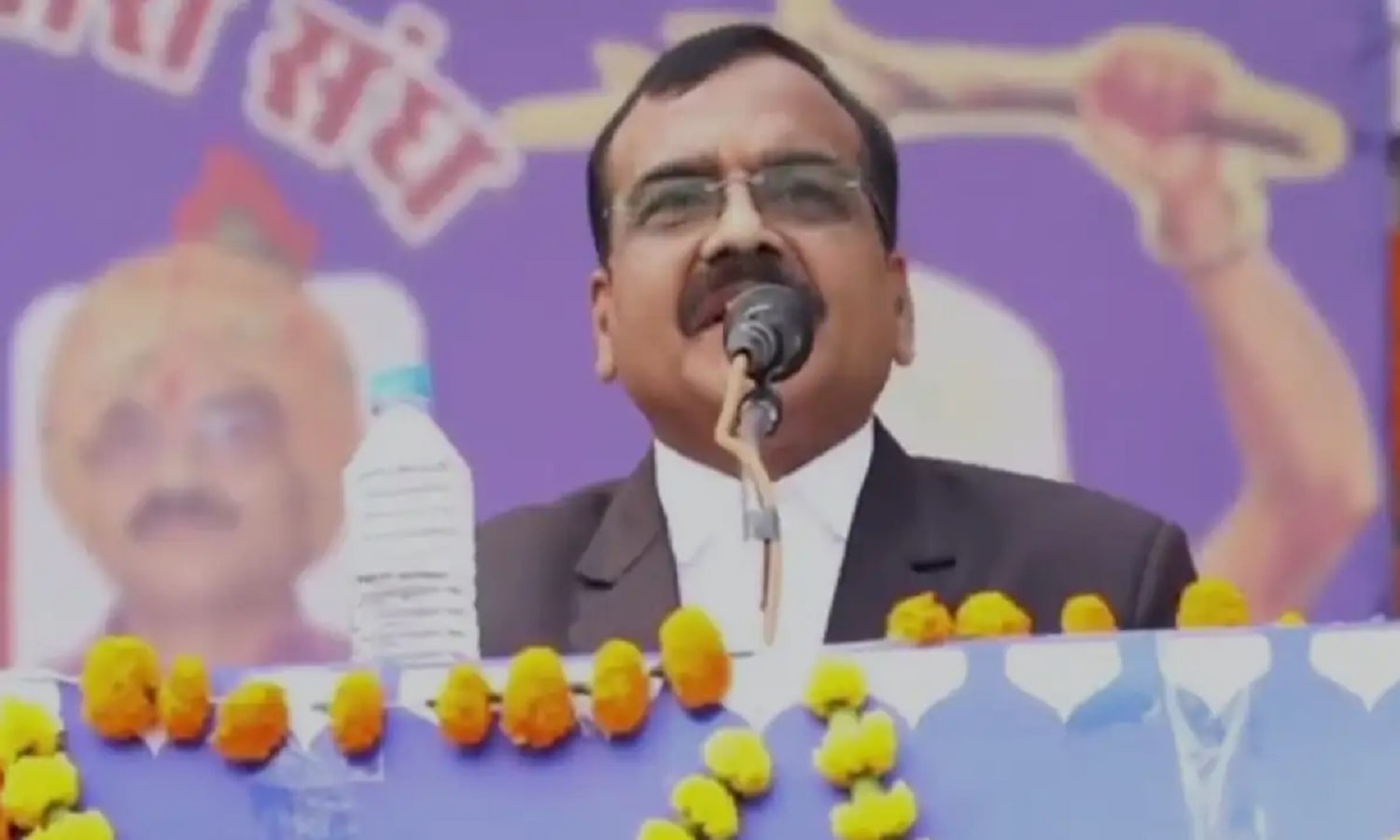 A file containing a notice or order displayed outside a government building, showing the administrative action of removing IAS officer Santosh Verma from his post.