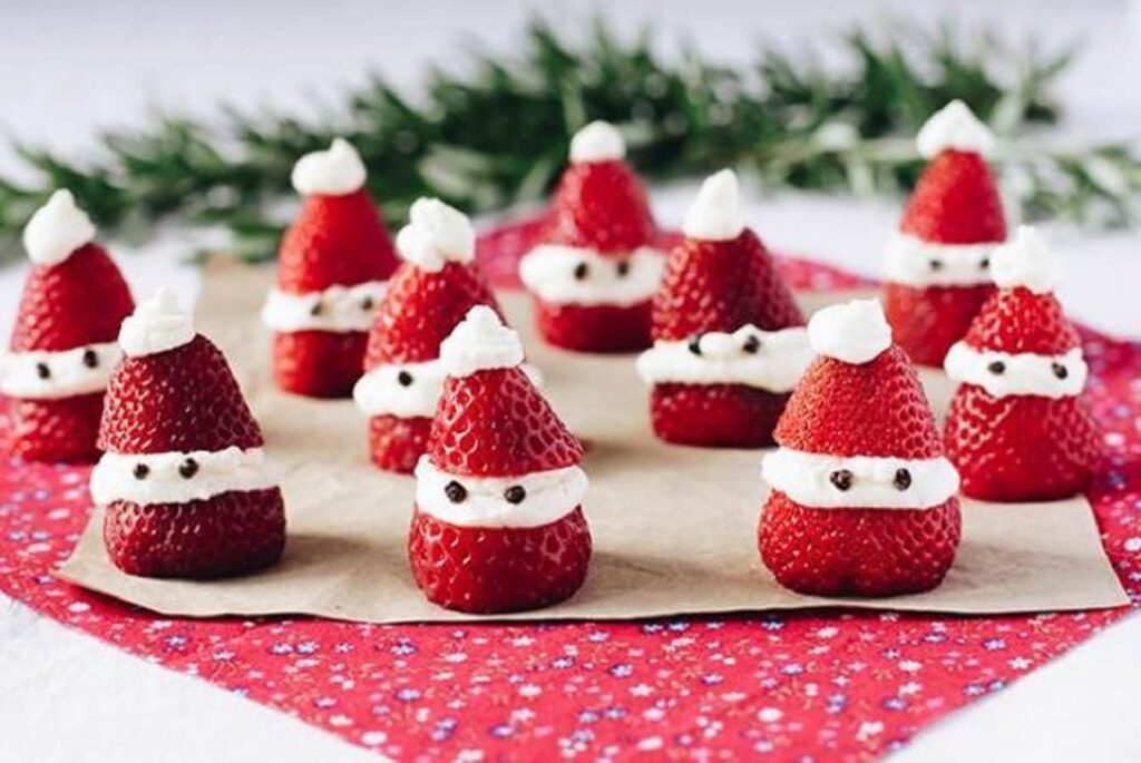 Christmas-themed sweet dish made with strawberries and cream, styled as festive dessert for kids and adults