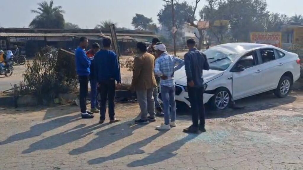 Car damaged after hitting road divider at Silpara Ring Road in Rewa, locals gathered at accident spot