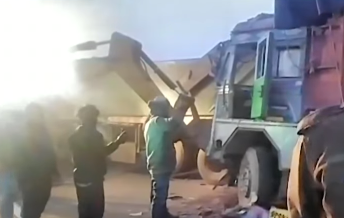 Rescue operation underway after a trailer collided with a parked truck amid dense fog in Rewa.