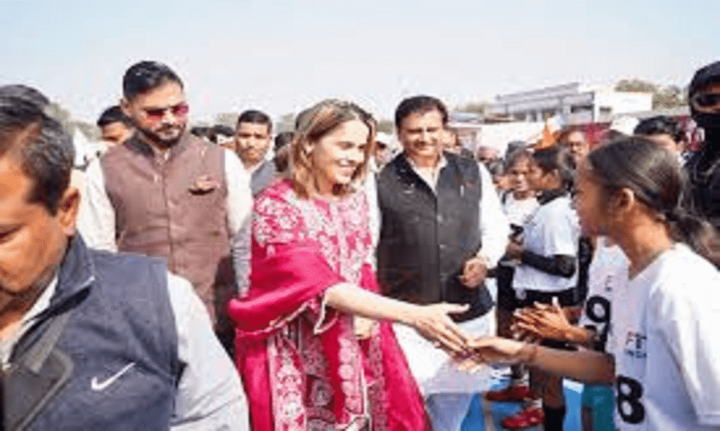 Badminton player Saina Nehwal greeting young players during a sports event in Satna, Madhya Pradesh