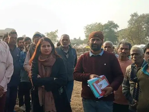 Officials inspecting procurement centre records during inquiry in Sidhi district