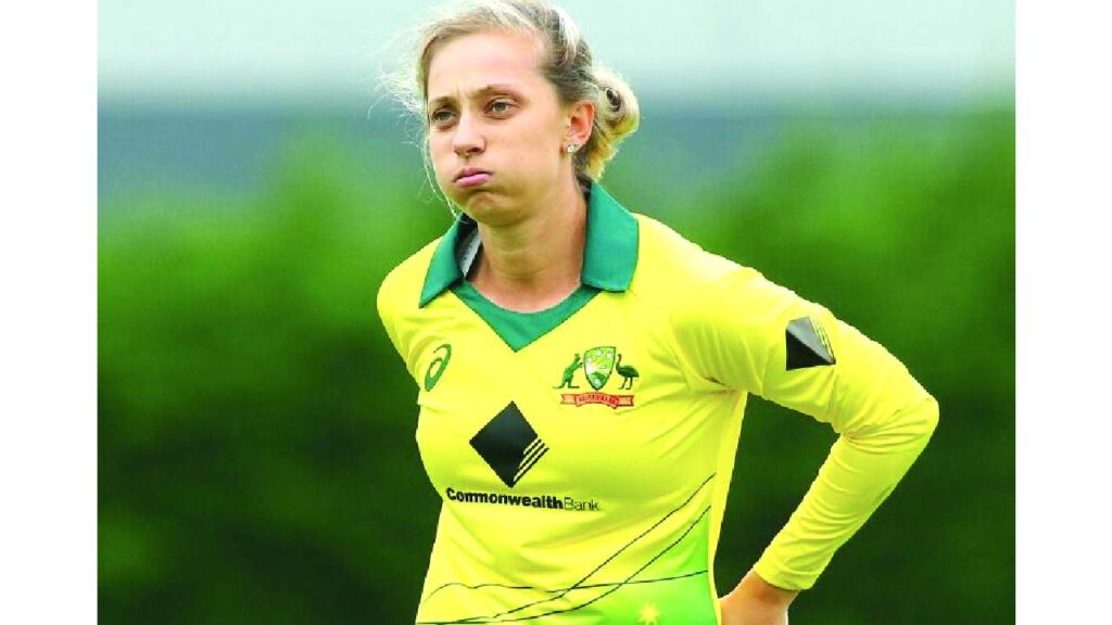 Australia cricketer Ashleigh Gardner raising bat and helmet during an international match