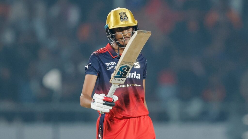 RCB cricketer Gautami Naik walking back after a brilliant batting performance in WPL 2026 match