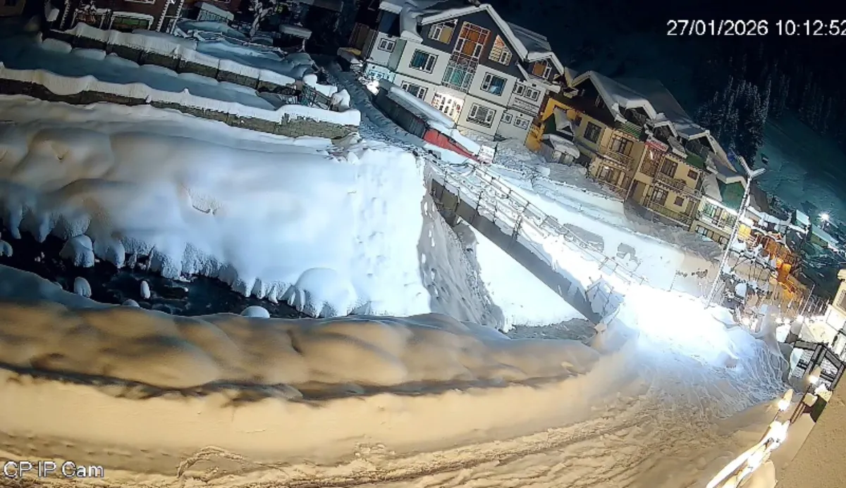CCTV footage still showing a massive cloud of snow hitting buildings in Sonamarg.