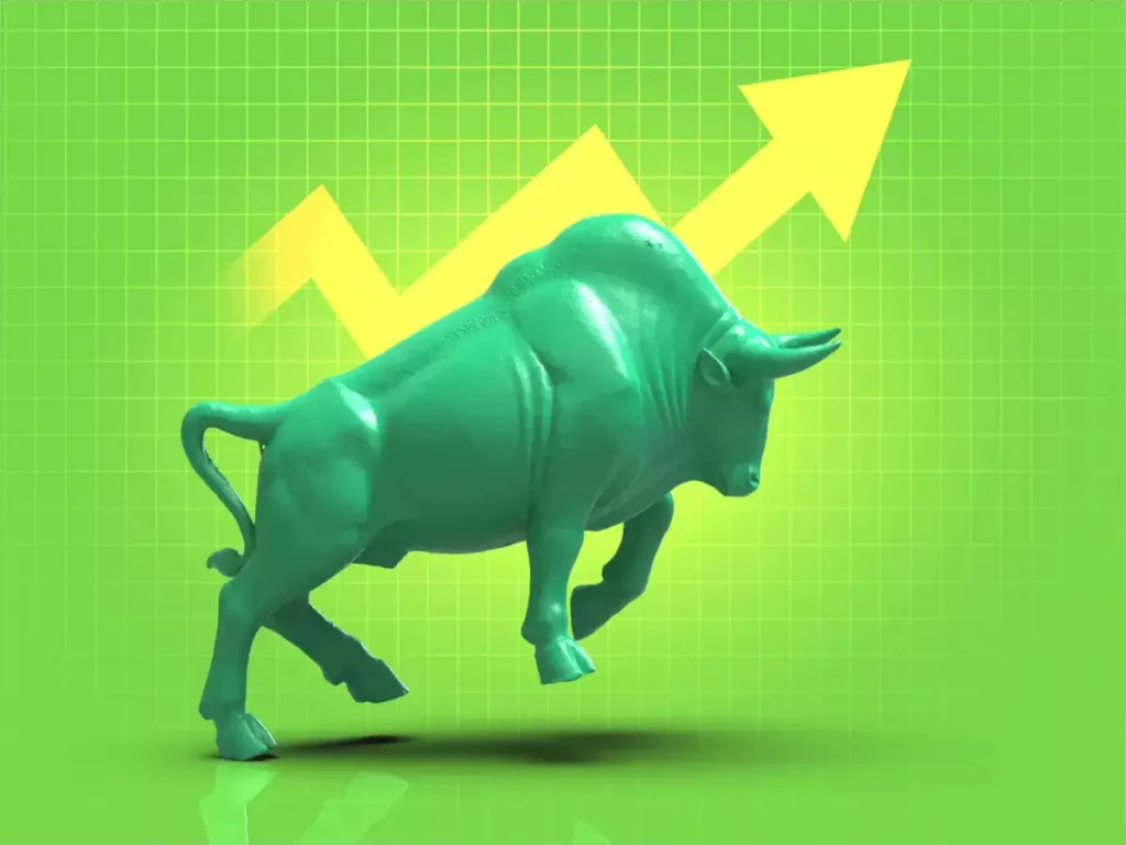 Green bull statue representing a bullish trend in the Indian stock market with a rising arrow.