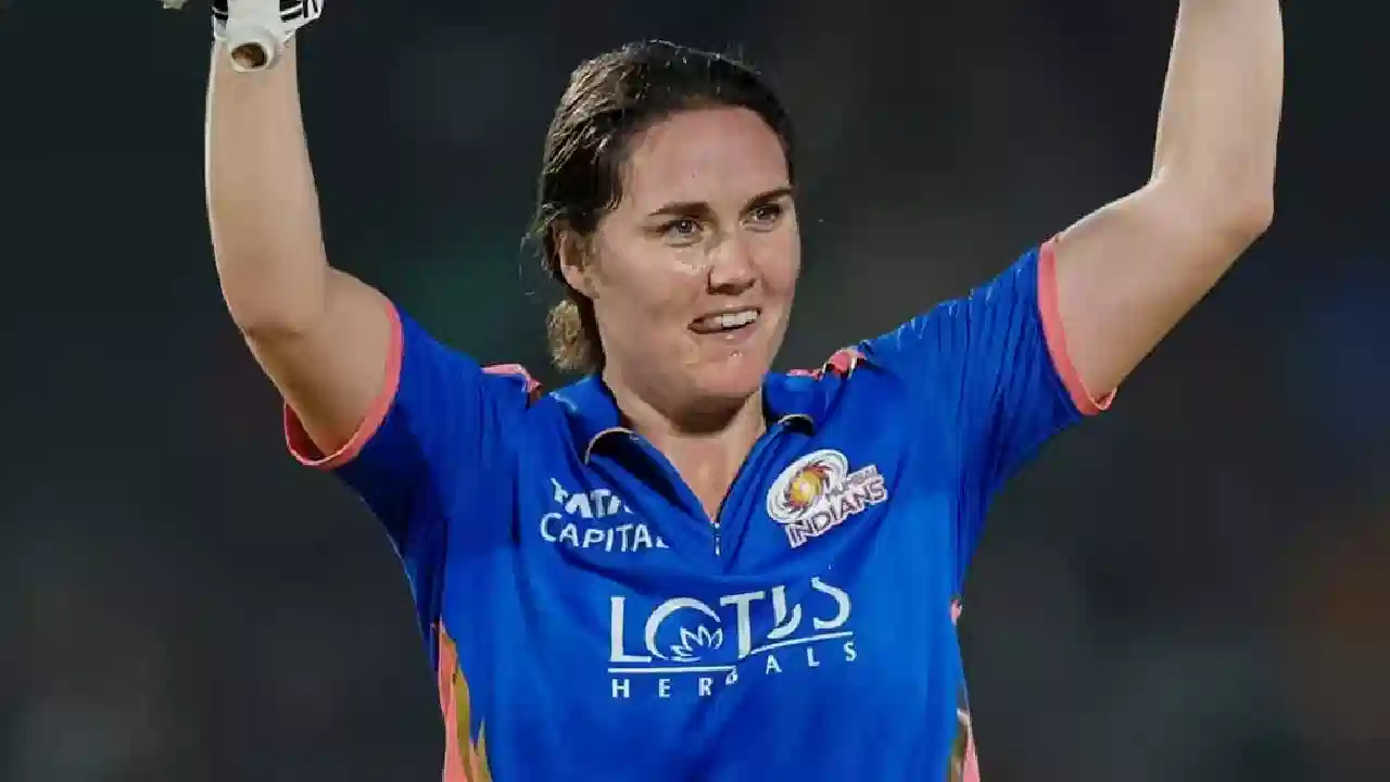 Nat Sciver-Brunt celebrating her historic century for Mumbai Indians against RCB in WPL 2026