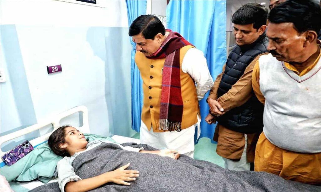 Madhya Pradesh Chief Minister visiting a hospital patient during official inspection