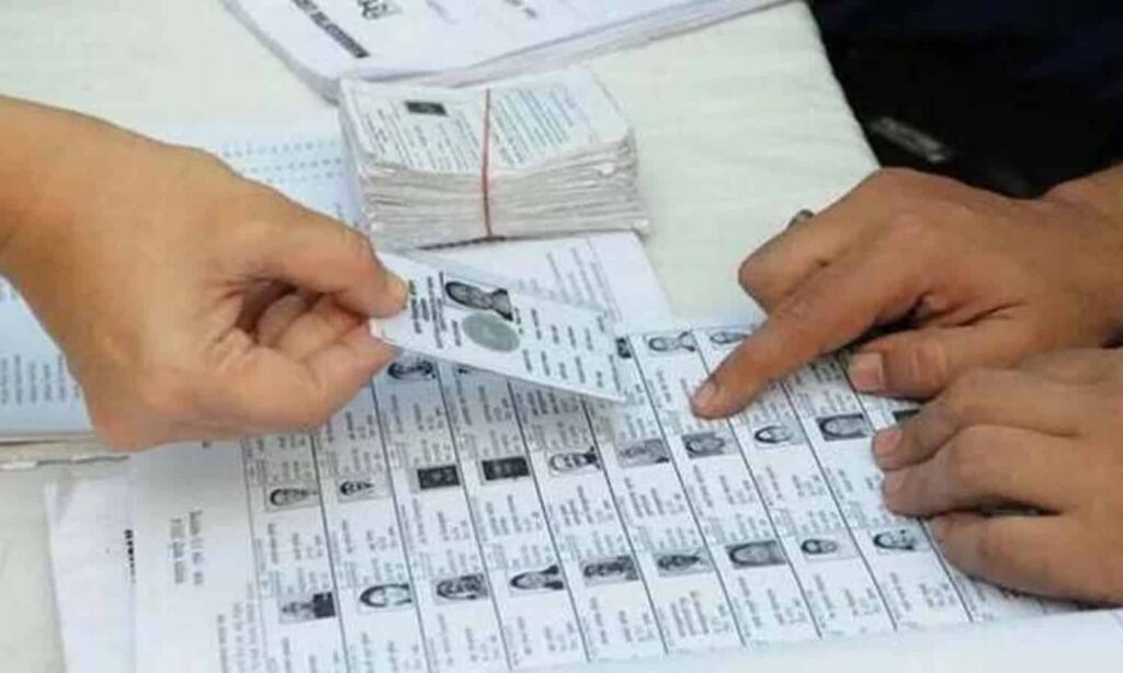 Voter list verification during Indian assembly elections showing electoral rolls
