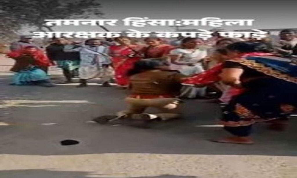 Protest scene with crowd; police managing law and order during demonstration