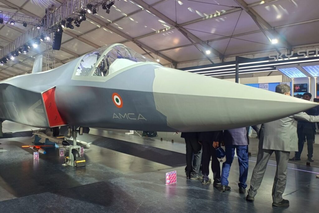 A full-scale model of India's AMCA fifth-generation stealth fighter jet displayed at a defense expo.