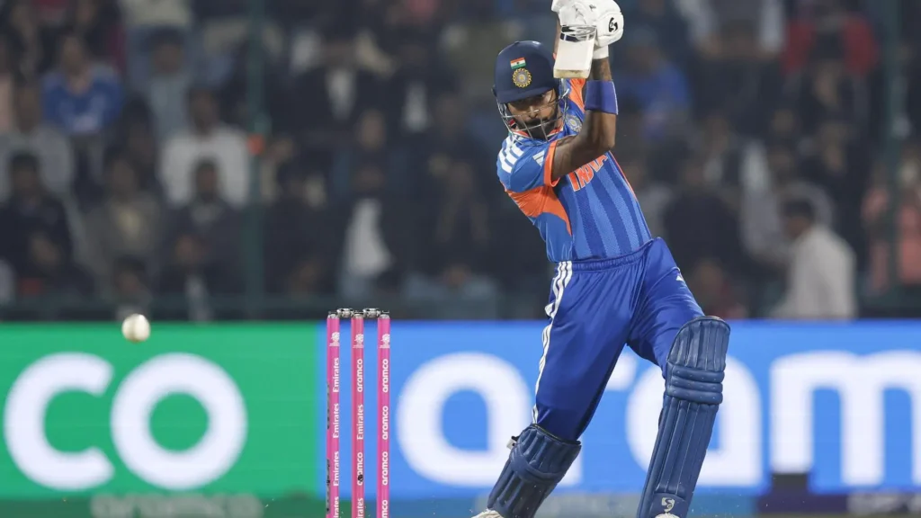 Hardik Pandya celebrating a boundary during a T20 World Cup match.