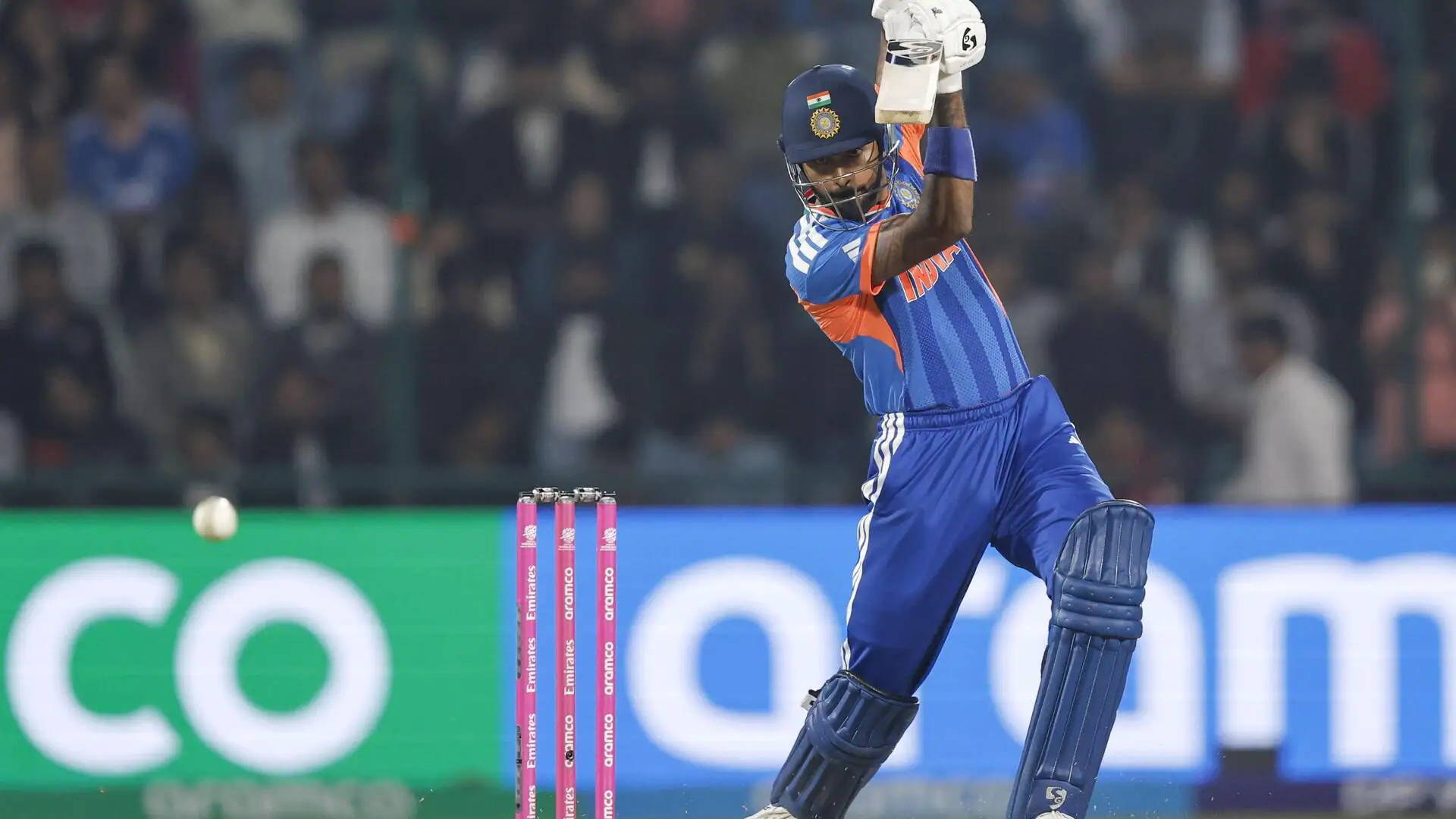 Hardik Pandya celebrating a boundary during a T20 World Cup match.