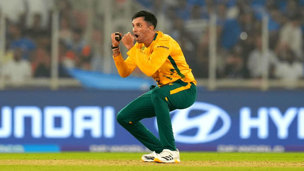Spinner Keshav Maharaj inspecting the Narendra Modi Stadium pitch during the T20 World Cup.