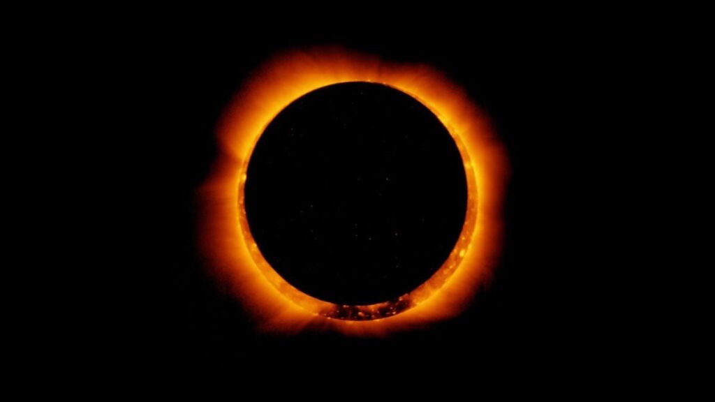 Annular solar eclipse showing a bright ring of fire around the dark moon disk.