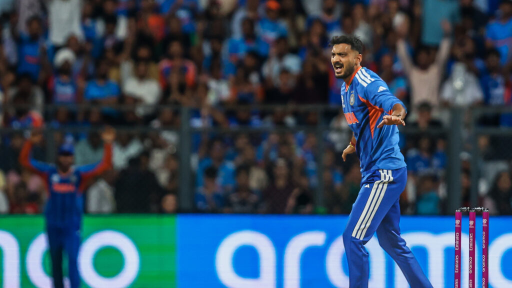 Indian cricketer Axar Patel fielding at the boundary during the T20 World Cup match against England.