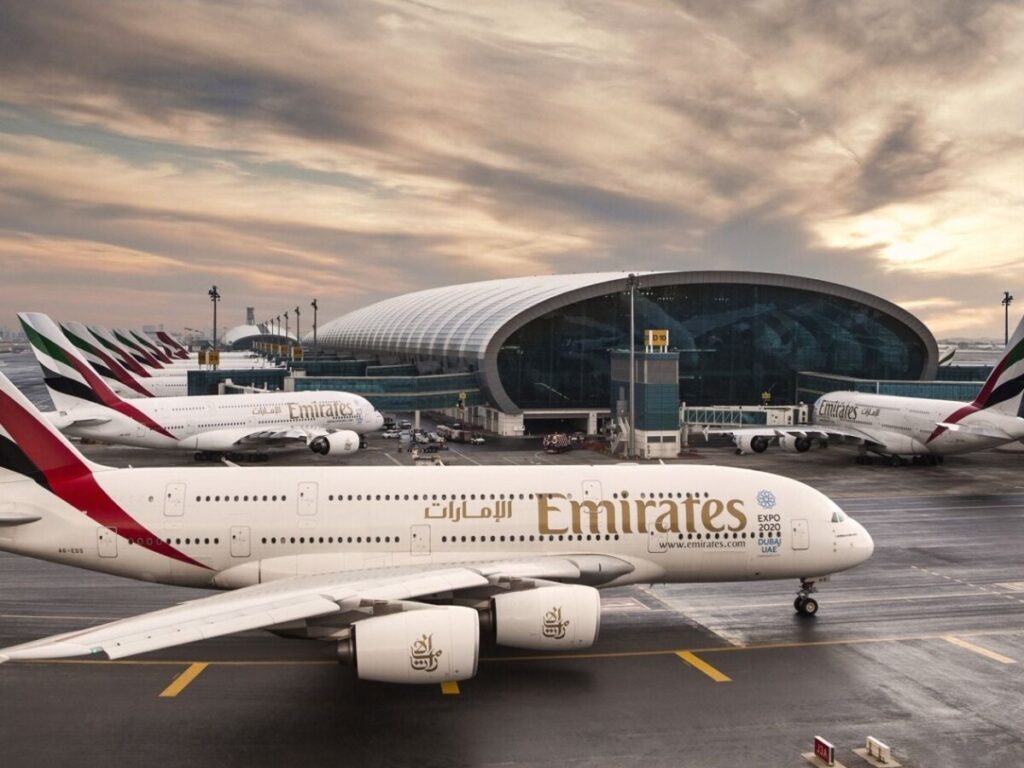 Commercial airplanes parked on tarmac as UAE reopens airspace for international flights amid regional tensions.