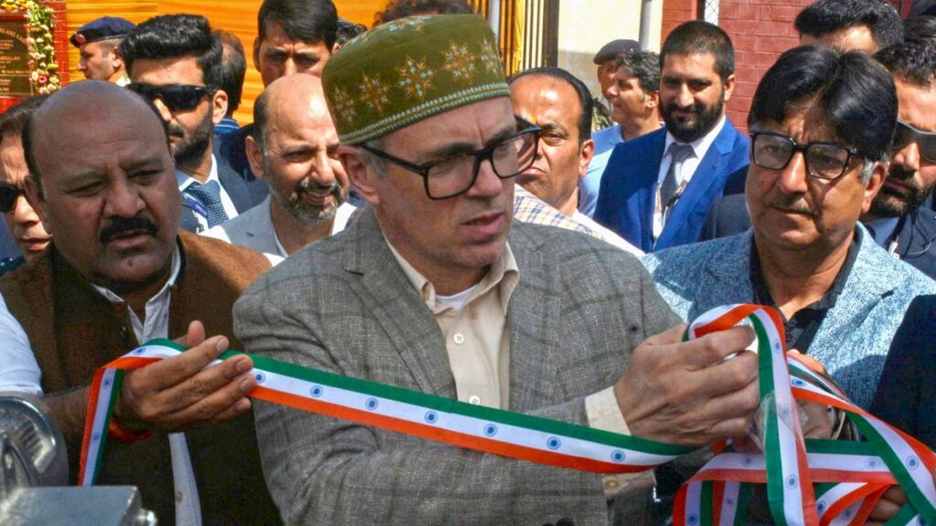 CM Omar Abdullah refusing to cut tricolor ribbon at inauguration ceremony.