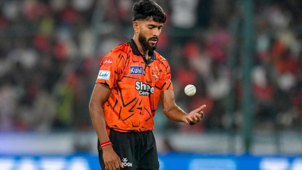 Prafull celebrating after taking three wickets in his debut IPL over