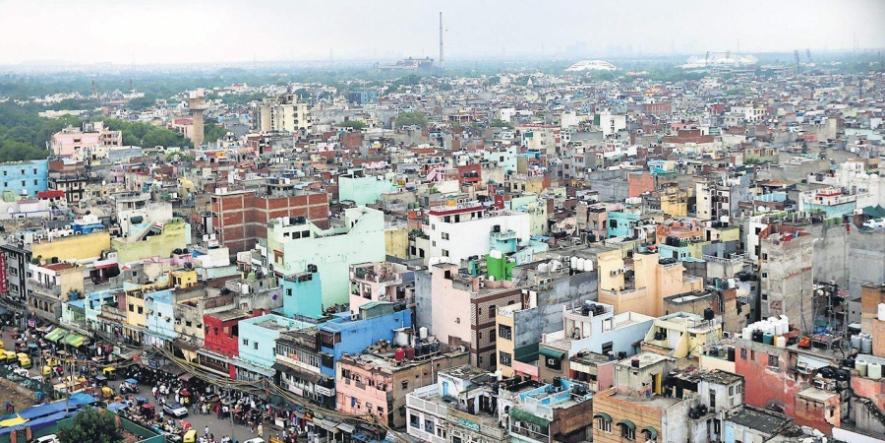 Aerial view of unauthorized residential colonies in Delhi being regularized under PM-UDAY scheme.