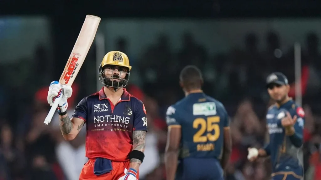 Virat Kohli celebrating 800 boundaries and 300 sixes milestone in IPL 2026 match.