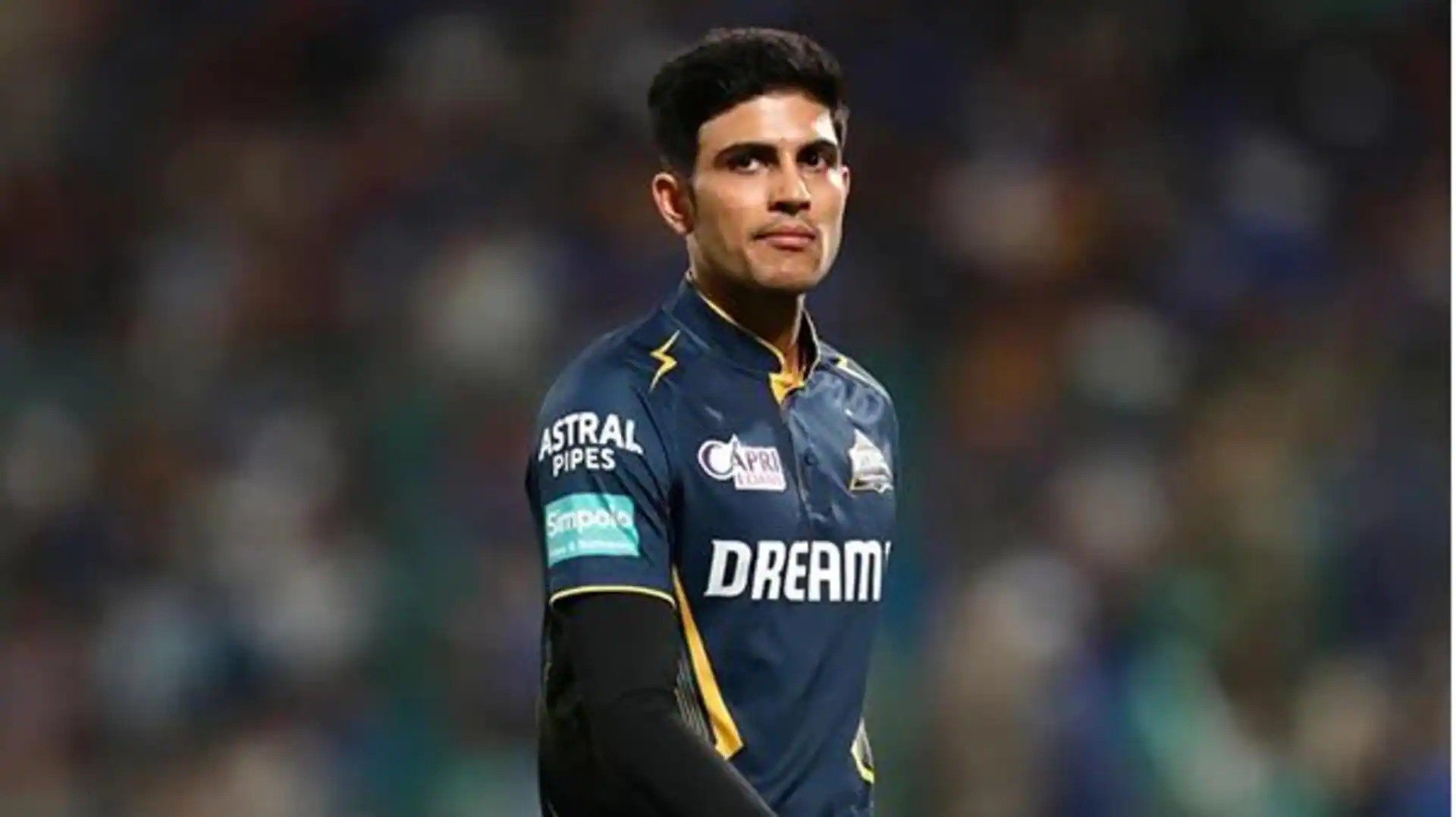 Shubman Gill looking disappointed during DC vs GT IPL 2026 match after slow over rate penalty.