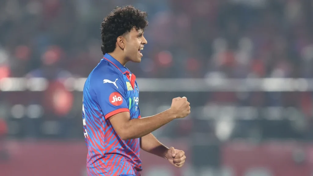 Madhav Tiwari bowling for Delhi Capitals against Punjab Kings in IPL 2026 Dharamsala match.