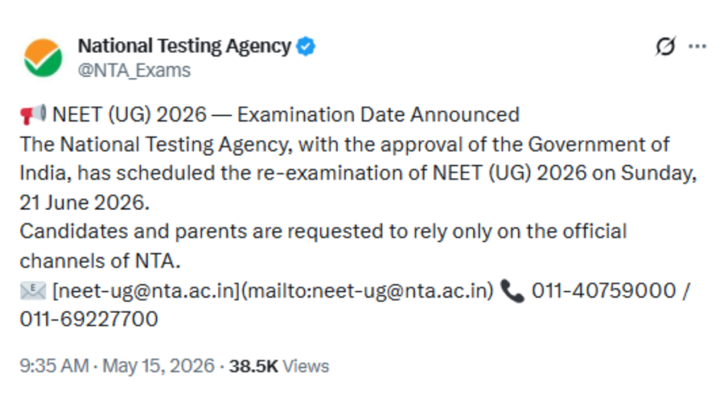 A medical student looking closely at the NEET UG examination notification on a laptop screen.