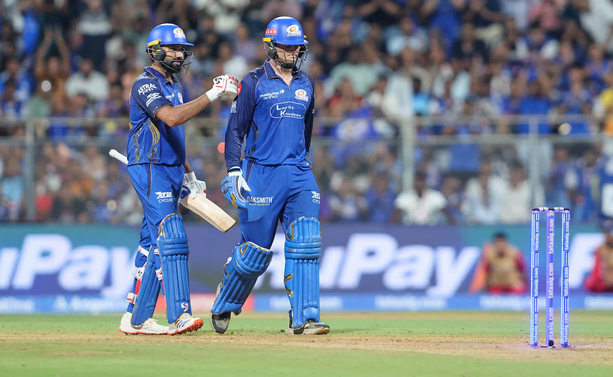 Ryan Rickelton and Rohit Sharma celebrating Mumbai Indians victory against LSG in IPL 2026.