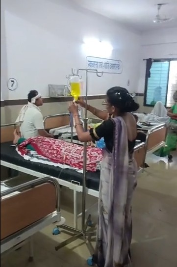 Sanitation worker turns 'doctor' at Mauganj Civil Hospital.