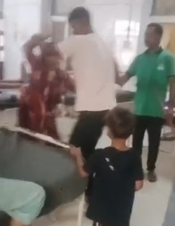 Couple brutally beaten following a dispute over a stretcher at Satna District Hospital.