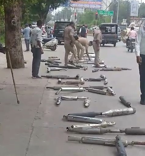 Bulldozers run over modified silencers in Rewa.