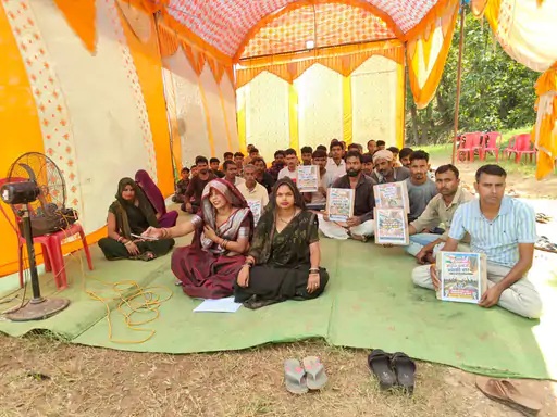Leela Sahu and villagers stage an indefinite sit-in protest for a road in Sidhi.
